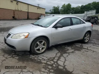 2009 Pontiac G6 1SA with VIN 1G2ZG57N494225551, listed as a Copart auction lot 61635675 with 76,598 mi miles and Salvage title. Bid and sale history available at DreamBid. Image 1.