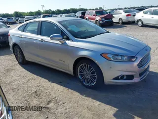 2013 Ford Fusion SE Hybrid with VIN 3FA6P0LU6DR127108, listed as a IAAI auction lot 42023529 with 250,057 mi miles. Bid and sale history available at carsss.com. Image 1.