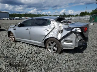 2014 Kia Optima LX z VIN 5XXGM4A79EG311308, wystawiony jako Copart lot #58212405 z przebiegiem 147 006 mil mil oraz Szkoda całkowita • Salvage title. Historia ofert i sprzedaży dostępna na DreamBid. Obrazek 2.