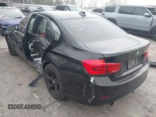 2018 BMW 3 Series 320i with VIN WBA8E1G51JNU91319, listed as a IAAI auction lot 41690084 with 67,609 mi miles. Bid and sale history available at carsss.com. Image 3.