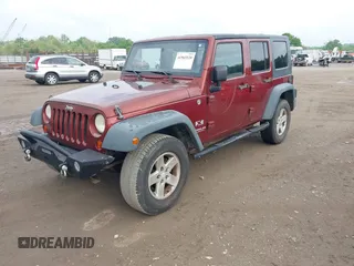 2008 Jeep Wrangler Unlimited X with VIN 1J4GA39108L606685, listed as a IAAI auction lot 41965538 with 288,946 mi miles. Bid and sale history available at carsss.com. Image 2.