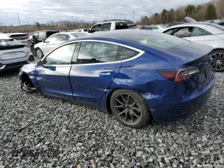 2020 Tesla Model 3 Long Range with VIN 5YJ3E1EB0LF664562, listed as a Copart auction lot 50484355 with 31,884 mi miles and Salvage Title. Bid and sale history available at carsss.com. Image 2.