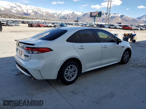 2021 Toyota Corolla Hybrid LE with VIN JTDEAMDE2MJ030570, listed as a Copart auction lot 50530625 with 80,249 mi miles and Salvage Title. Bid and sale history available at carsss.com. Image 3.