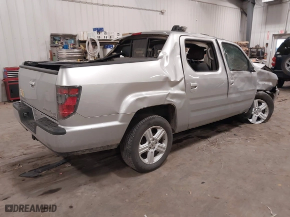 2014 Honda Ridgeline RTL with VIN 5FPYK1F57EB012362, listed as a IAAI auction lot 41078509 with 149,590 mi miles. Bid and sale history available at carsss.com. Image 4.