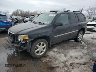 2007 GMC Envoy SLT with VIN 1GKDT13S972141714, listed as a Copart auction lot 46589735 with 82,556 mi miles and Salvage Title. Bid and sale history available at carsss.com. Image 1.