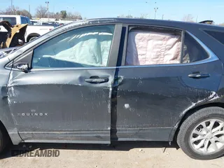 2021 Chevrolet Equinox LT with VIN 3GNAXUEV7ML312716, listed as a IAAI auction lot 41675270 with 47,887 mi miles and . Bid and sale history available at DreamBid. Image 14.