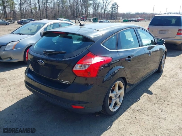 2012 Ford Focus Titanium with VIN 1FAHP3N25CL428522, listed as a IAAI auction lot 41773538 with NaN miles. Bid and sale history available at carsss.com. Image 4.