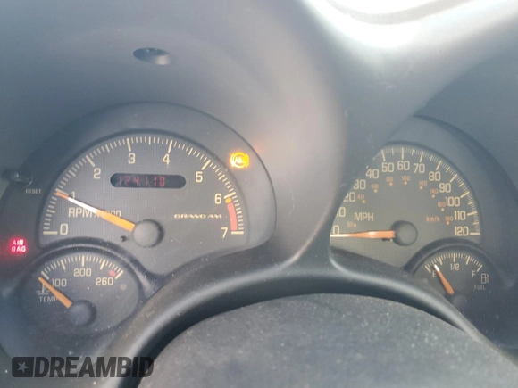 1999 Pontiac Grand Am SE2 with VIN 1G2NE52E2XM732523, listed as a Copart auction lot 75420684 with 124,110 mi miles and Salvage Title. Bid and sale history available at carsss.com. Image 9.