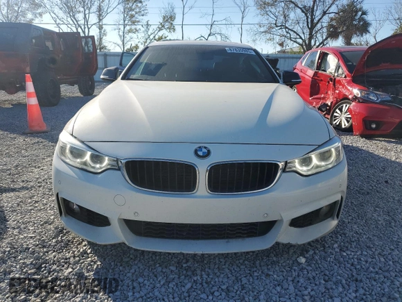 2016 BMW 4 Series 428i with VIN WBA3N7C58GK225681, listed as a Copart auction lot 87835985 with 67,683 mi miles and Salvage Title. Bid and sale history available at carsss.com. Image 5.