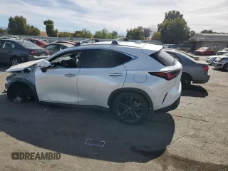 2022 Lexus NX with VIN JTJHKCFZ5N2003795, listed as a Copart auction lot 73545734 with 19,722 mi miles and Salvage Title. Bid and sale history available at carsss.com. Image 2.
