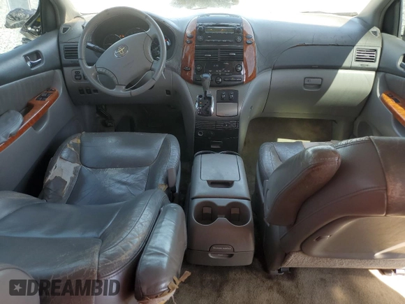 2006 Toyota Sienna XLE z VIN 5TDZA22C46S446651, wystawiony jako Copart lot #52866735 z przebiegiem 269 343 mil mil oraz Szkoda całkowita • Salvage title. Historia ofert i sprzedaży dostępna na DreamBid. Obrazek 8.