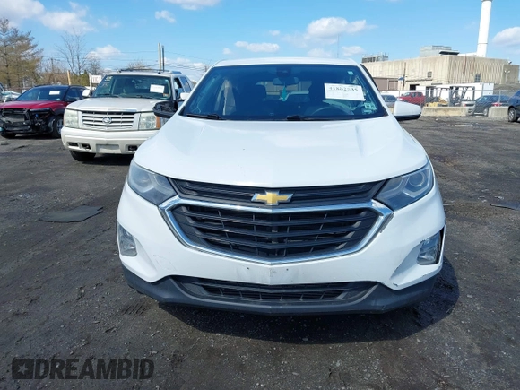 2020 Chevrolet Equinox LT z VIN 2GNAXKEV8L6141918, wystawiony jako IAAI lot #41882535 z przebiegiem 125 974 mil mil oraz . Historia ofert i sprzedaży dostępna na DreamBid. Obrazek 13.