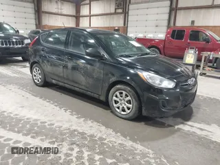 2013 Hyundai Accent GS with VIN KMHCT5AEXDU063399, listed as a IAAI auction lot 41927844 with 297,470 mi miles and . Bid and sale history available at DreamBid. Image 1.