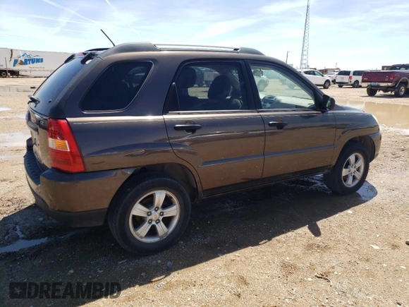 2009 Kia Sportage LX with VIN KNDJF724697568334, listed as a Copart auction lot 54056605 with 252,049 mi miles and Clean Title. Bid and sale history available at carsss.com. Image 3.
