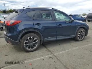 2016 Mazda CX-5 Grand Touring with VIN JM3KE4DY4G0750939, listed as a Copart auction lot 52727395 with 72,428 mi miles and Salvage Title. Bid and sale history available at carsss.com. Image 3.