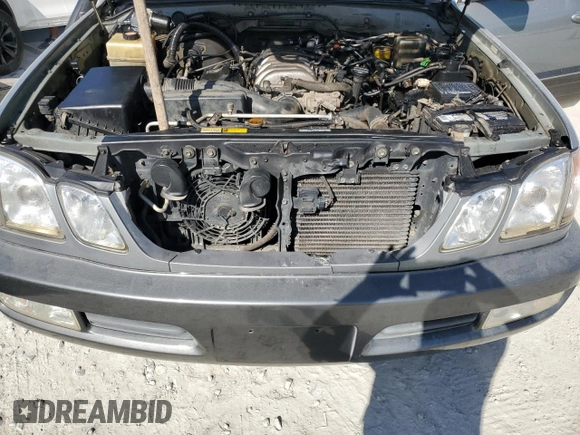 2002 Lexus LX 470 z VIN JTJHT00W723514716, wystawiony jako Copart lot #42646295 z przebiegiem 188 817 mil mil oraz Szkoda całkowita • Salvage title. Historia ofert i sprzedaży dostępna na DreamBid. Obrazek 11.