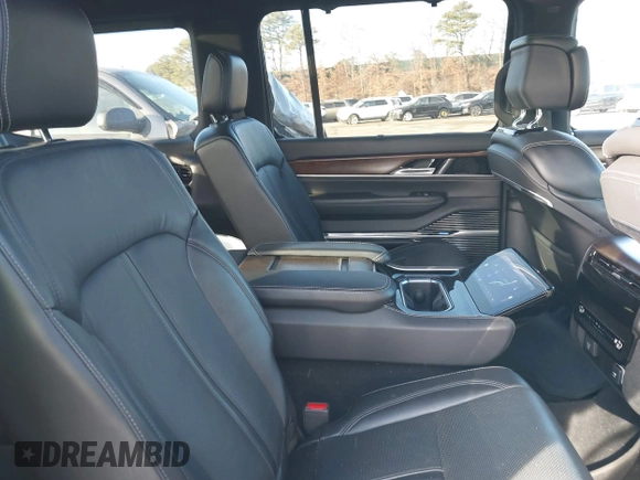 2022 Jeep Grand Wagoneer Series I with VIN 1C4SJVEJ9NS104227, listed as a IAAI auction lot 41421966 with 25,576 mi miles and . Bid and sale history available at DreamBid. Image 8.