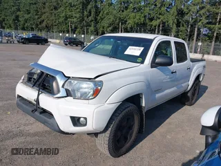 2015 Toyota Tacoma with VIN 3TMLU4EN5FM182720, listed as a IAAI auction lot 42555728 with 183,081 mi miles and . Bid and sale history available at DreamBid. Image 14.