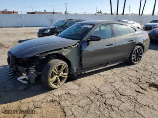 2023 BMW i4 eDrive40 with VIN WBY73AW08PFN97116, listed as a Copart auction lot 67344213 with 12,299 mi miles. Bid and sale history available at carsss.com. Image 1.