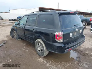 2007 Honda Pilot EX-L with VIN 5FNYF28557B027087, listed as a IAAI auction lot 41356244 with 183,923 mi miles. Bid and sale history available at carsss.com. Image 3.