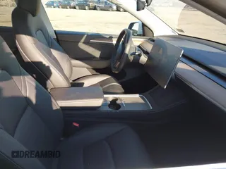 2023 Tesla Model Y Long Range z VIN 7SAYGDEE5PF765326, wystawiony jako IAAI lot #41757113 z przebiegiem 10 461 mil mil oraz . Historia ofert i sprzedaży dostępna na DreamBid. Obrazek 5.