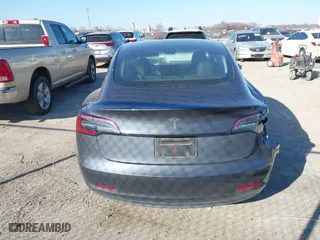 2023 Tesla Model 3 with VIN 5YJ3E1EA3PF678825, listed as a IAAI auction lot 41283153 with 8,607 mi miles. Bid and sale history available at carsss.com. Image 16.