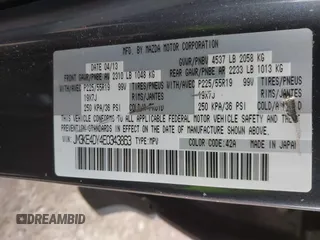 2014 Mazda CX-5 Grand Touring with VIN JM3KE4DY4E0343863, listed as a IAAI auction lot 41770402 with 117,615 mi miles. Bid and sale history available at carsss.com. Image 9.