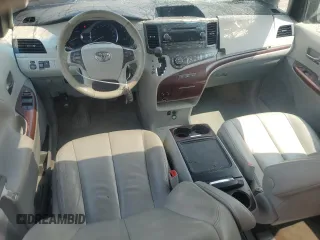 2014 Toyota Sienna Limited z VIN 5TDDK3DC2ES075367, wystawiony jako Copart lot #54010085 z przebiegiem 148 312 mil mil oraz Szkoda całkowita • Salvage title. Historia ofert i sprzedaży dostępna na DreamBid. Obrazek 8.