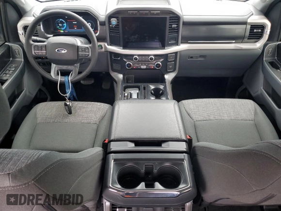 2023 Ford F-150 Lightning Pro with VIN 1FTVW1EL8PWG38419, listed as a Copart auction lot 47630535 with 11,940 mi miles and Salvage Title. Bid and sale history available at DreamBid. Image 8.