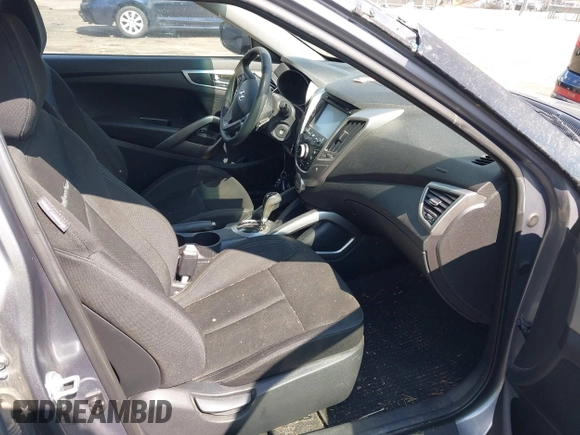 2013 Hyundai Veloster w/Gray Int with VIN KMHTC6ADXDU172104, listed as a IAAI auction lot 42198689 with 67,160 mi miles and . Bid and sale history available at DreamBid. Image 5.