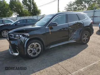 2025 BMW X1 xDrive28i with VIN WBX73EF03S5100614, listed as a Copart auction lot 60411735 with 20,383 mi miles and Clean title. Bid and sale history available at DreamBid. Image 1.