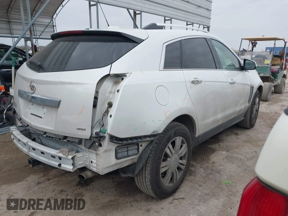 2015 Cadillac SRX Luxury Collection z VIN 3GYFNBE31FS552323, wystawiony jako IAAI lot #41553081 z przebiegiem 91 214 mil mil oraz . Historia ofert i sprzedaży dostępna na DreamBid. Obrazek 4.