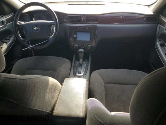 2014 Chevrolet Impala LT with VIN 2G1WB5E3XE1128402, listed as a Copart auction lot 63413525 with 101,161 mi miles and Salvage title. Bid and sale history available at DreamBid. Image 8.
