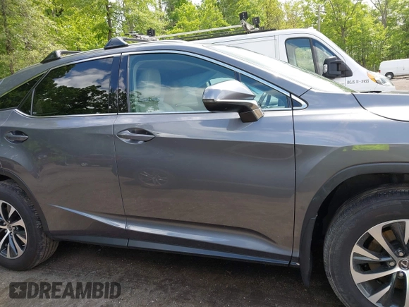 2022 Lexus RX 350 z VIN 2T2HZMDA8NC313731, wystawiony jako IAAI lot #42190259 z przebiegiem 144 177 mil mil oraz . Historia ofert i sprzedaży dostępna na DreamBid. Obrazek 13.
