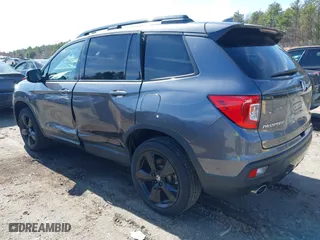 2021 Honda Passport Elite with VIN 5FNYF8H08MB011467, listed as a IAAI auction lot 41929708 with 34,106 mi miles. Bid and sale history available at carsss.com. Image 3.