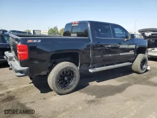 2015 Chevrolet Silverado 1500 LT with VIN 3GCUKREHXFG293456, listed as a Copart auction lot 73541744 with 160,031 mi miles and Salvage Title. Bid and sale history available at carsss.com. Image 3.