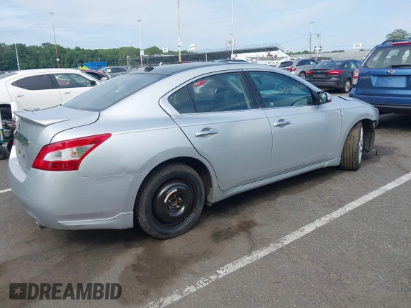 2010 Nissan Maxima SV with VIN 1N4AA5AP6AC826979, listed as a IAAI auction lot 42589811 with 154,724 mi miles and . Bid and sale history available at DreamBid. Image 4.