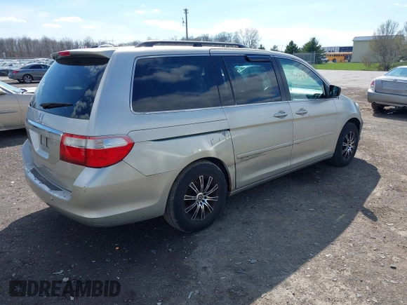 2007 Honda Odyssey Touring with VIN 5FNRL38827B045088, listed as a IAAI auction lot 42088752 with 224,655 mi miles. Bid and sale history available at carsss.com. Image 4.