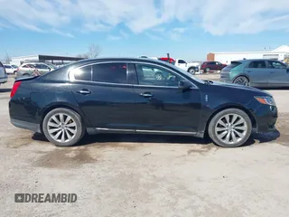 2014 Lincoln MKS with VIN 1LNHL9DK1EG604323, listed as a IAAI auction lot 41635817 with 223,136 mi miles. Bid and sale history available at carsss.com. Image 13.