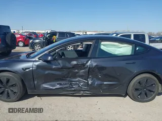 2024 Tesla Model 3 z VIN 5YJ3E1EA7RF721467, wystawiony jako IAAI lot #41857656 z przebiegiem 6 197 mil mil oraz . Historia ofert i sprzedaży dostępna na DreamBid. Obrazek 14.