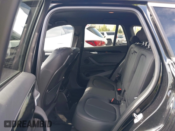 2019 BMW X1 sDrive28i with VIN WBXHU7C59K5L12320, listed as a IAAI auction lot 42116860 with 28,183 mi miles and . Bid and sale history available at DreamBid. Image 8.