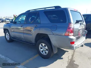 2003 Toyota 4Runner SR5 with VIN JTEZU14R238001341, listed as a IAAI auction lot 41670928 with 212,723 mi miles. Bid and sale history available at carsss.com. Image 3.
