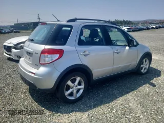 2009 Suzuki SX4 Man AWD with VIN JS2YB413196204559, listed as a Copart auction lot 61994234 with 180,757 mi miles and Salvage Title. Bid and sale history available at carsss.com. Image 3.