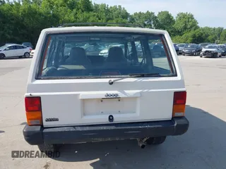 1996 Jeep Cherokee Sport z VIN 1J4FJ68S3TL226188, wystawiony jako IAAI lot #42460538 z przebiegiem 217 118 mil mil oraz . Historia ofert i sprzedaży dostępna na DreamBid. Obrazek 16.