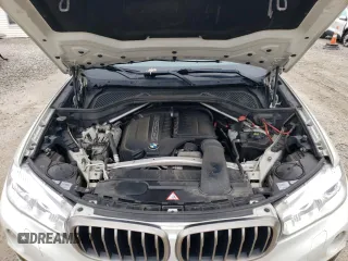 2015 BMW X6 xDrive35i z VIN 5UXKU2C58F0N77172, wystawiony jako Copart lot #55631415 z przebiegiem 246 622 mil mil oraz Tytuł czysty. Historia ofert i sprzedaży dostępna na DreamBid. Obrazek 12.