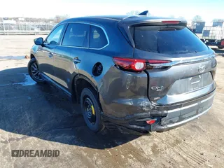 2022 Mazda CX-9 Sport with VIN JM3TCBBY5N0614589, listed as a IAAI auction lot 41295944 with 49,193 mi miles and . Bid and sale history available at DreamBid. Image 3.