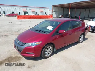 2010 Honda Insight EX with VIN JHMZE2H73AS009253, listed as a IAAI auction lot 41882569 with 104,839 mi miles and . Bid and sale history available at DreamBid. Image 2.