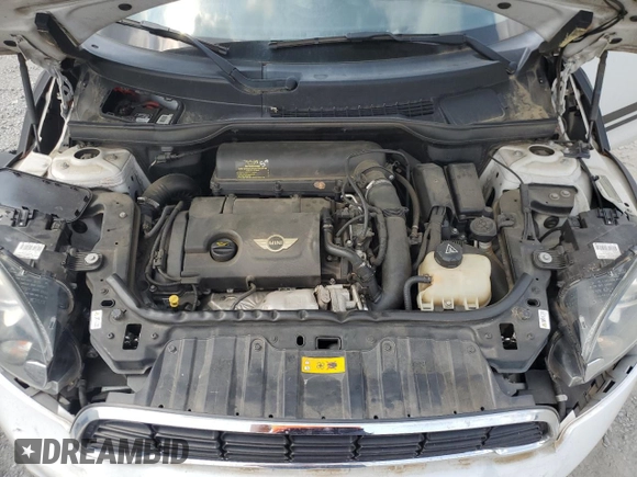2014 MINI Countryman S with VIN WMWZC3C53EWP27156, listed as a Copart auction lot 59579765 with 159,308 mi miles and Salvage title. Bid and sale history available at DreamBid. Image 11.