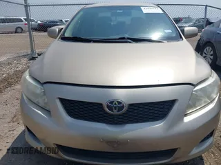 2009 Toyota Corolla with VIN 1NXBU40E69Z002692, listed as a IAAI auction lot 41942713 with 127,609 mi miles. Bid and sale history available at carsss.com. Image 12.