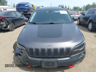 2019 Jeep Cherokee Trailhawk with VIN 1C4PJMBX2KD231734, listed as a IAAI auction lot 42235469 with 104,565 mi miles and . Bid and sale history available at DreamBid. Image 12.